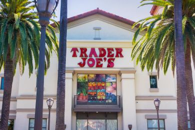 Trader Joes market with colorful produce under the logo