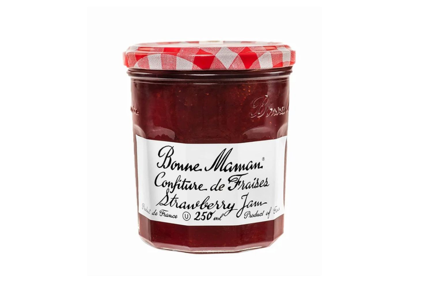 Jar of Bonne Maman strawberry jam on white background