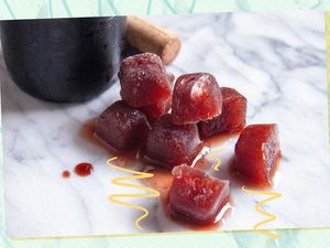 Frozen wine cubes slowly melting on a table