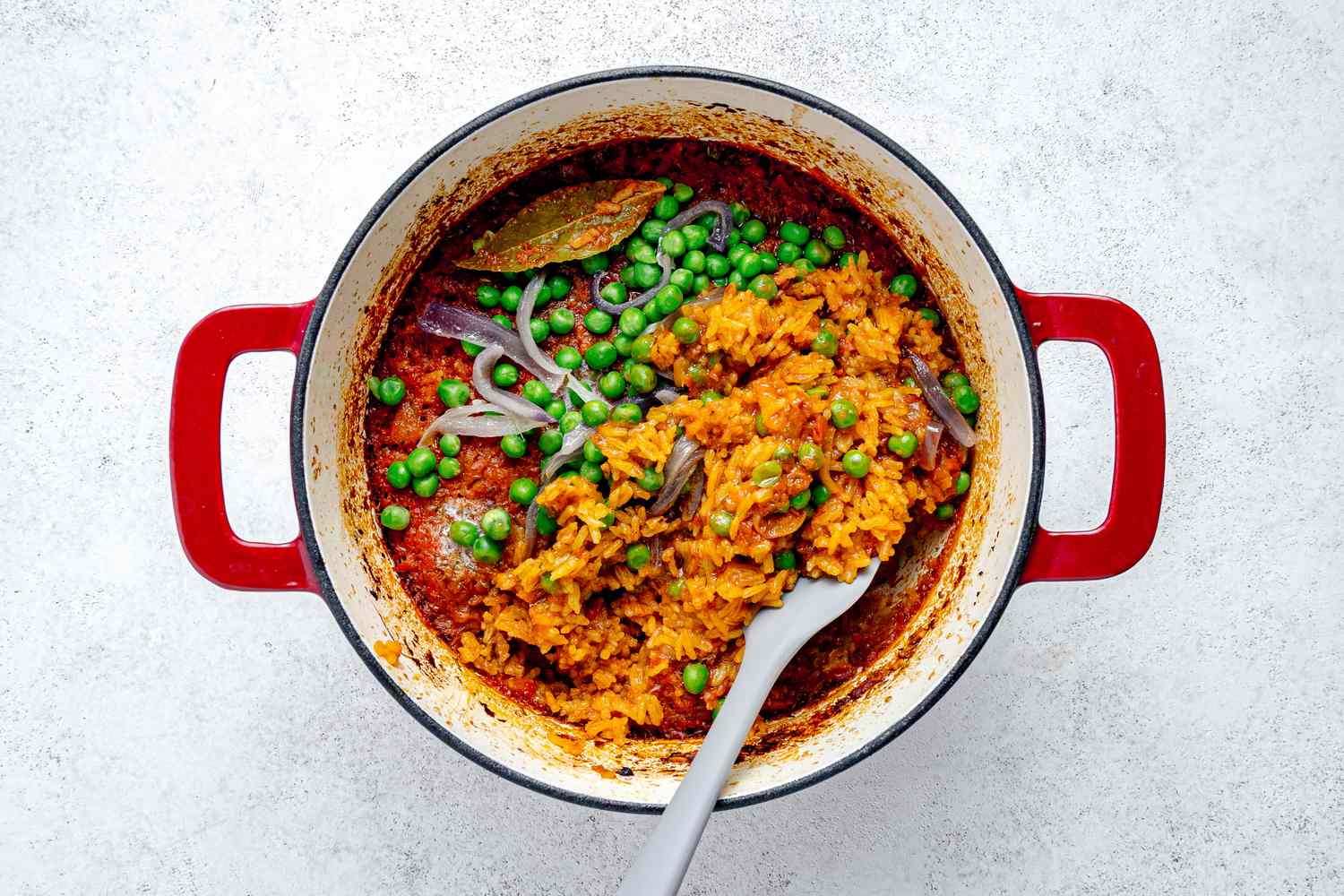 Spatula Stirring Ingredients Together in Dutch Oven