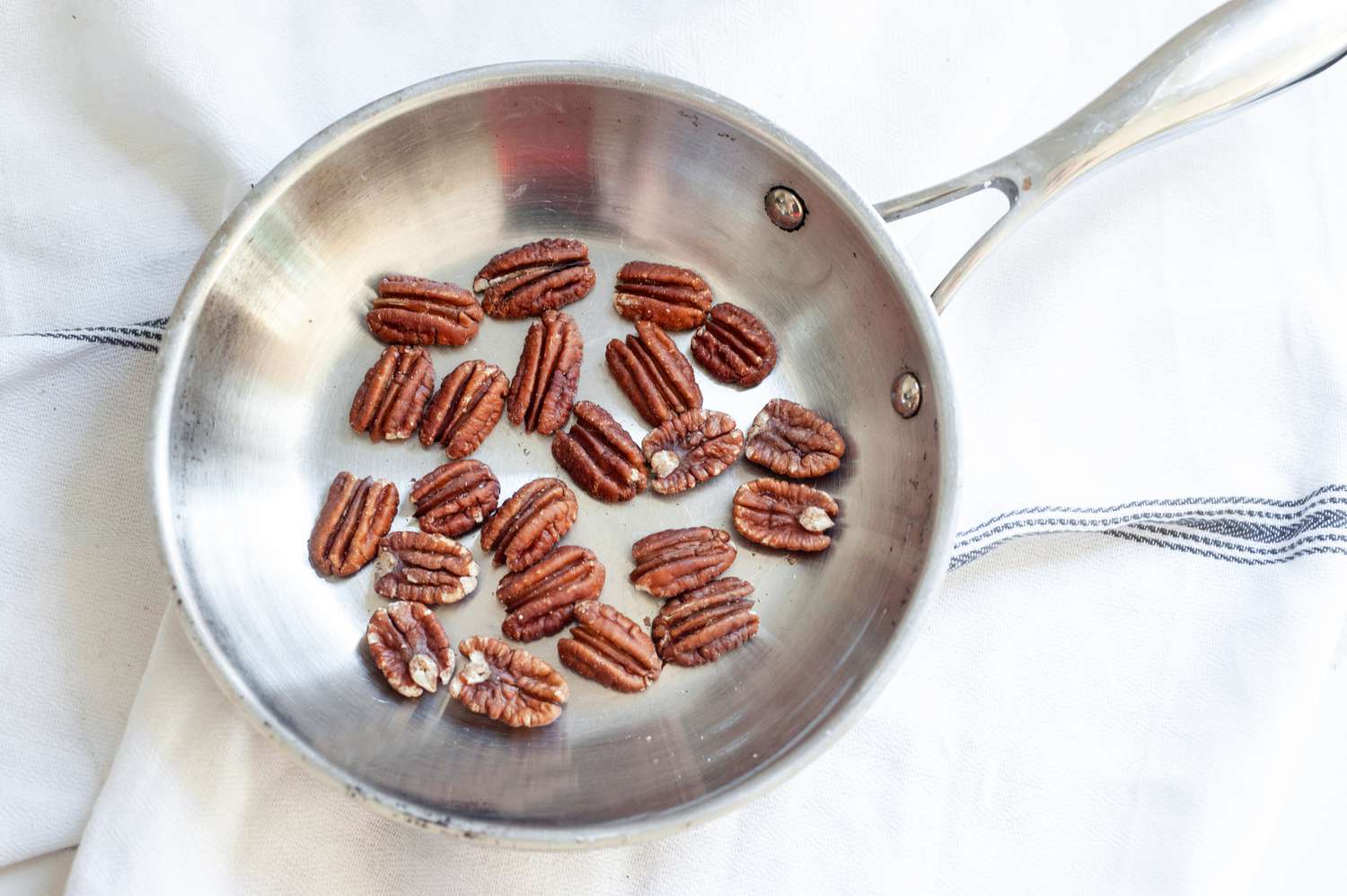 Toasted Pecans in a Skillet