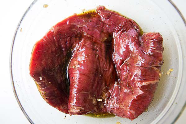 flank steak marinade in glass bowl