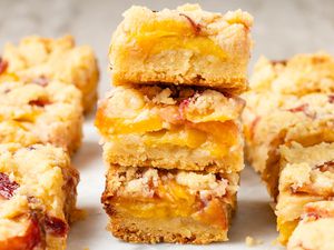 Peach pie bars stacked on top of each other 