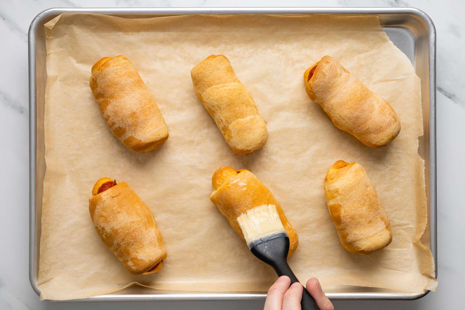 Butter Cooked Pepperoni Rolls on a Baking Tray