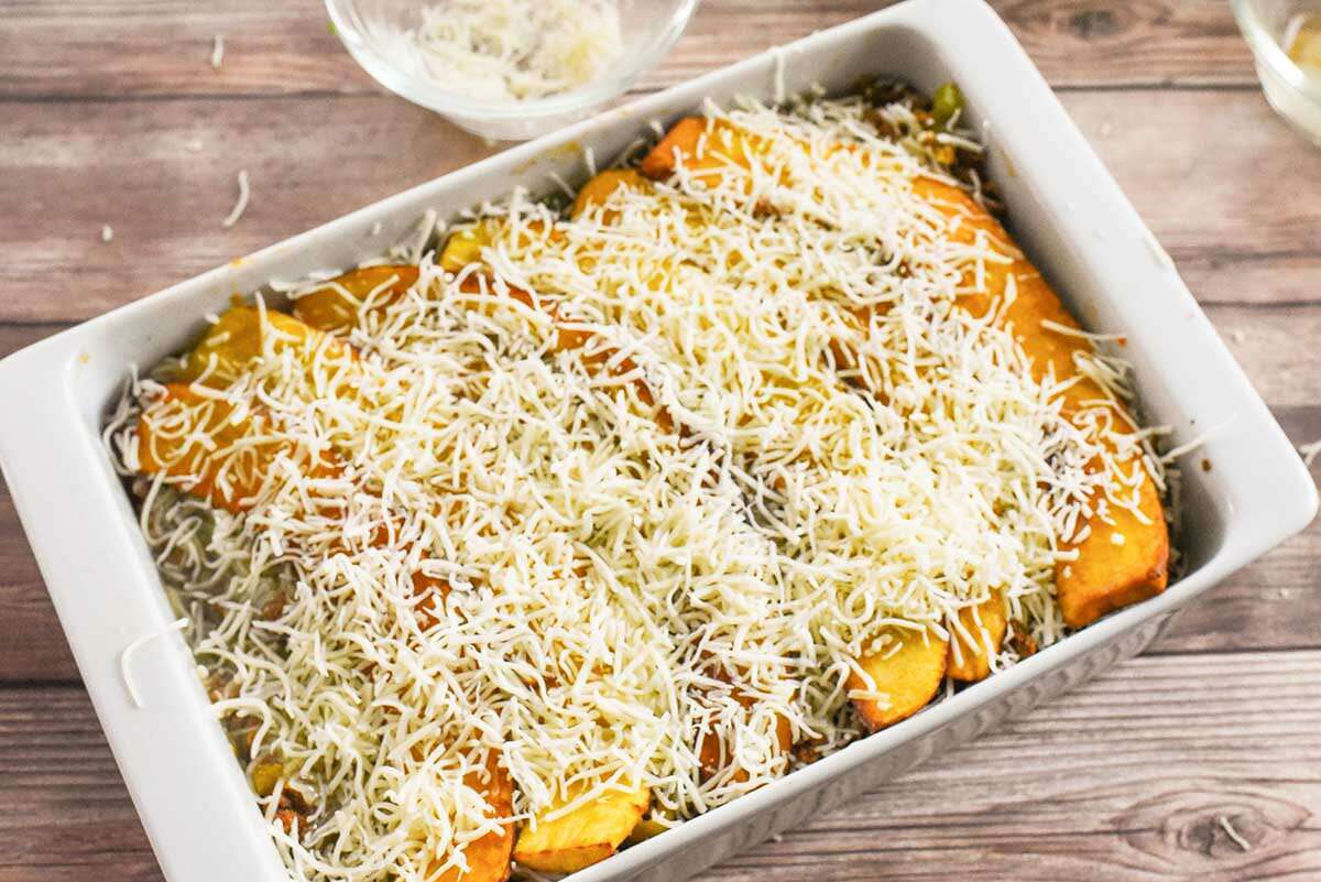 Plantain Lasagna with Beef and Cheese bake the pastelon and add cheese