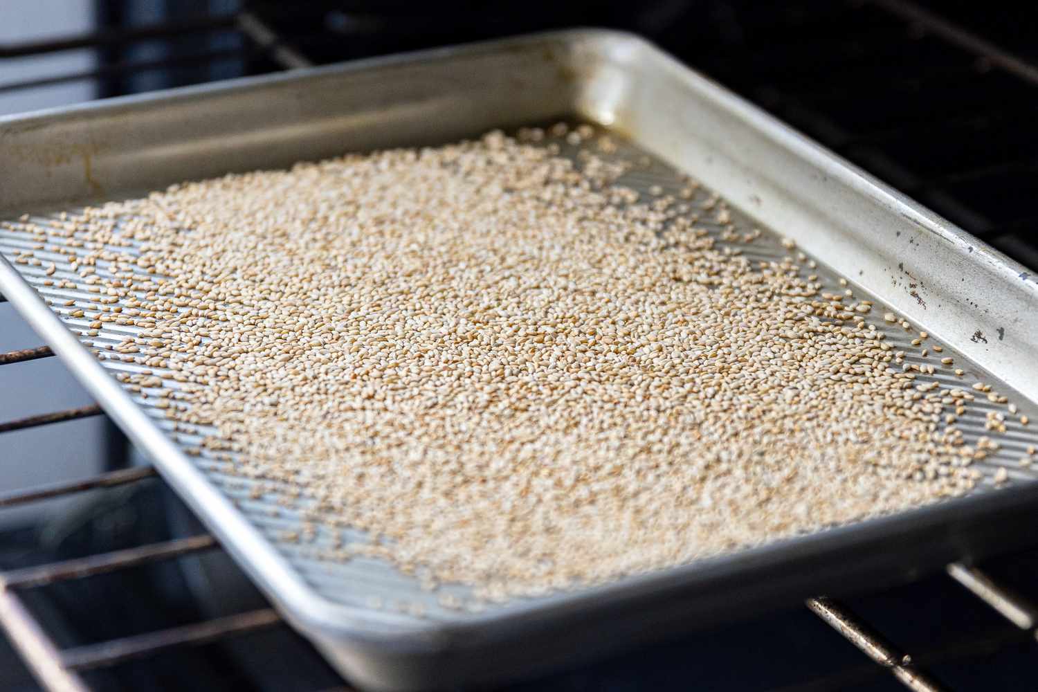 Raw Sesame Seeds on a Baking Sheet