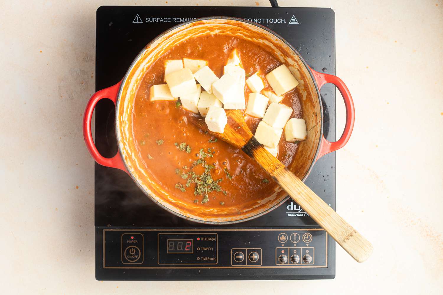 Add paneer to sauce for matar paneer