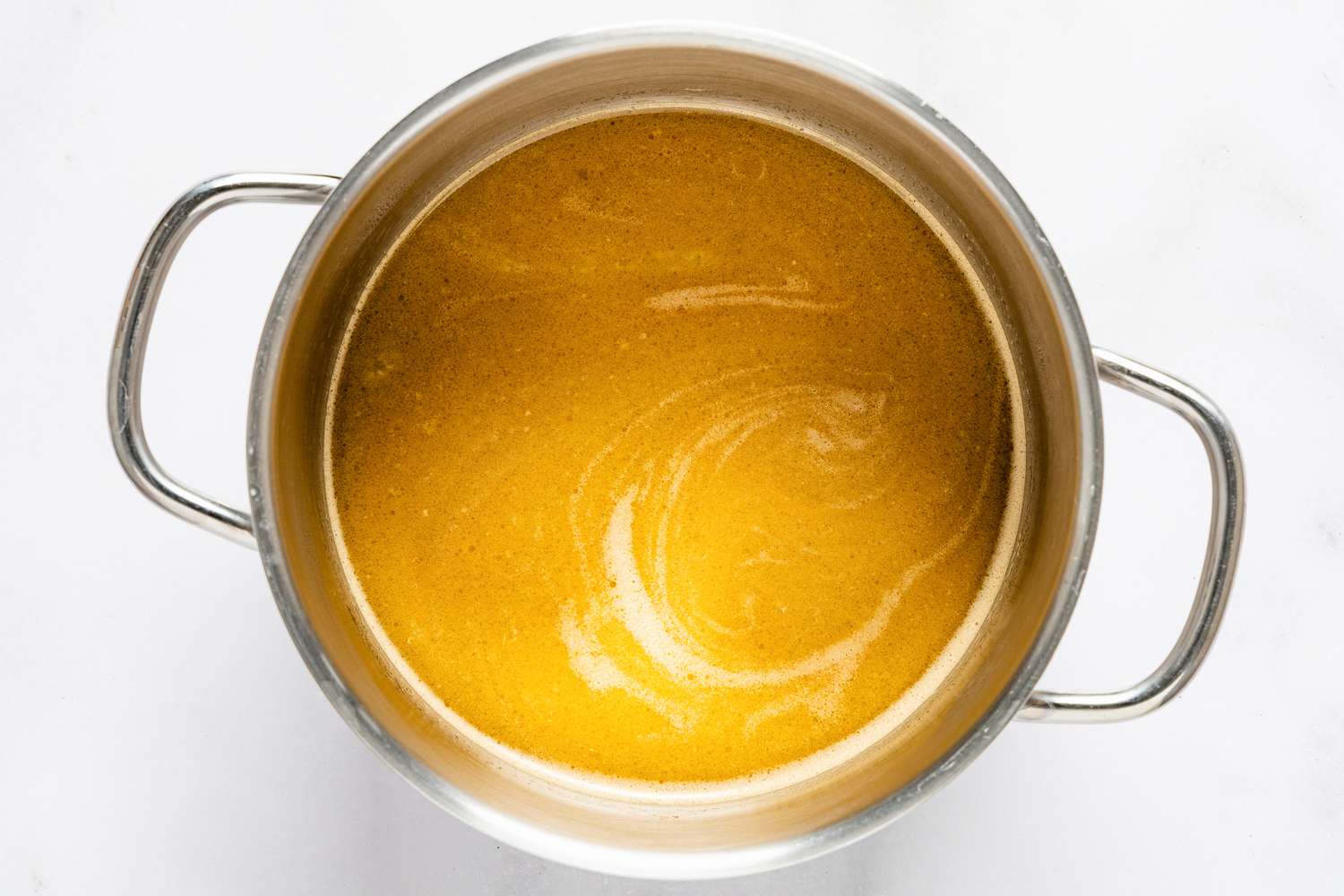 pot of melted butter and coffee for devil's food cake recipe