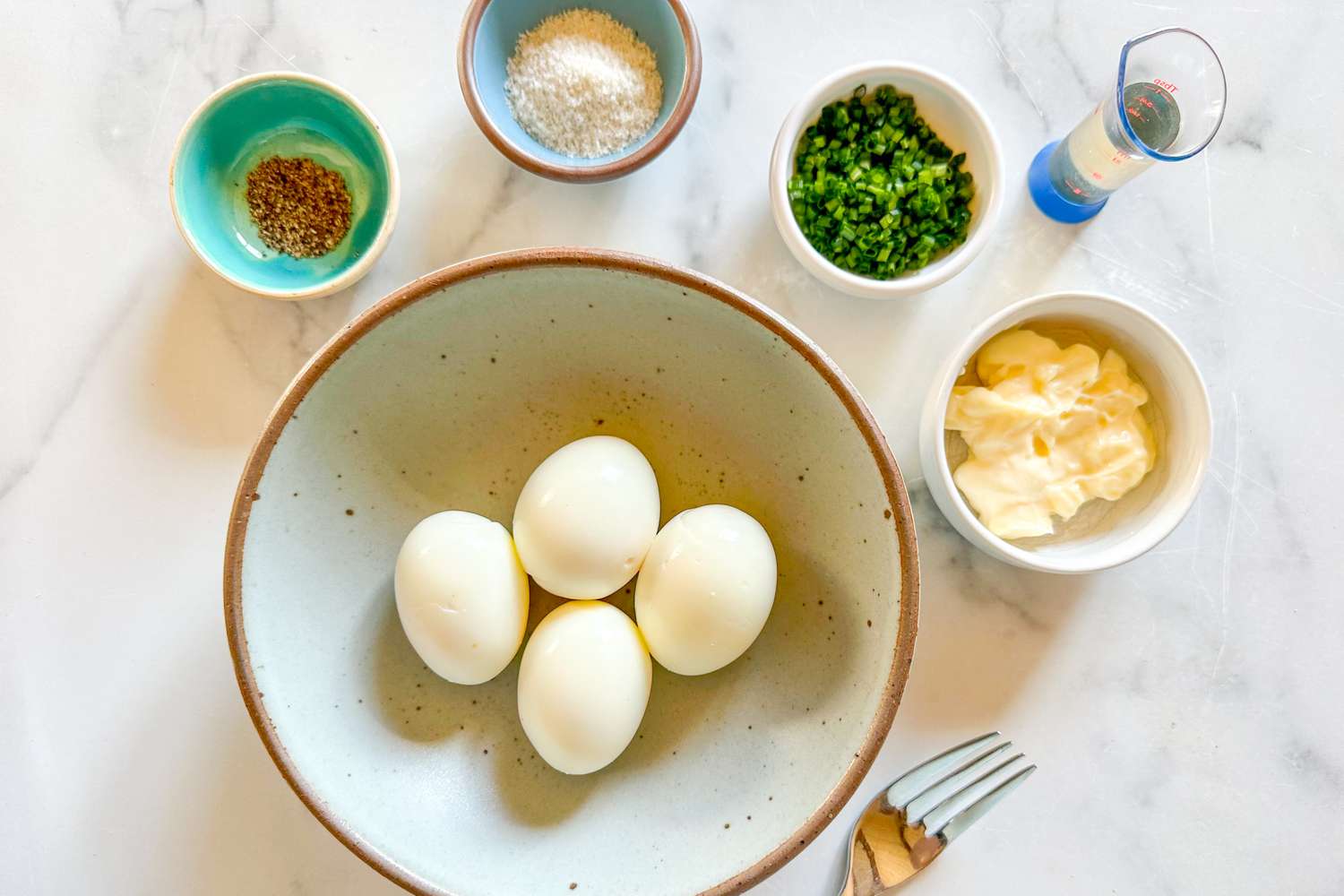 The 5-Ingredients for Egg Salad Served at Royal Tea in various bowls/vessels