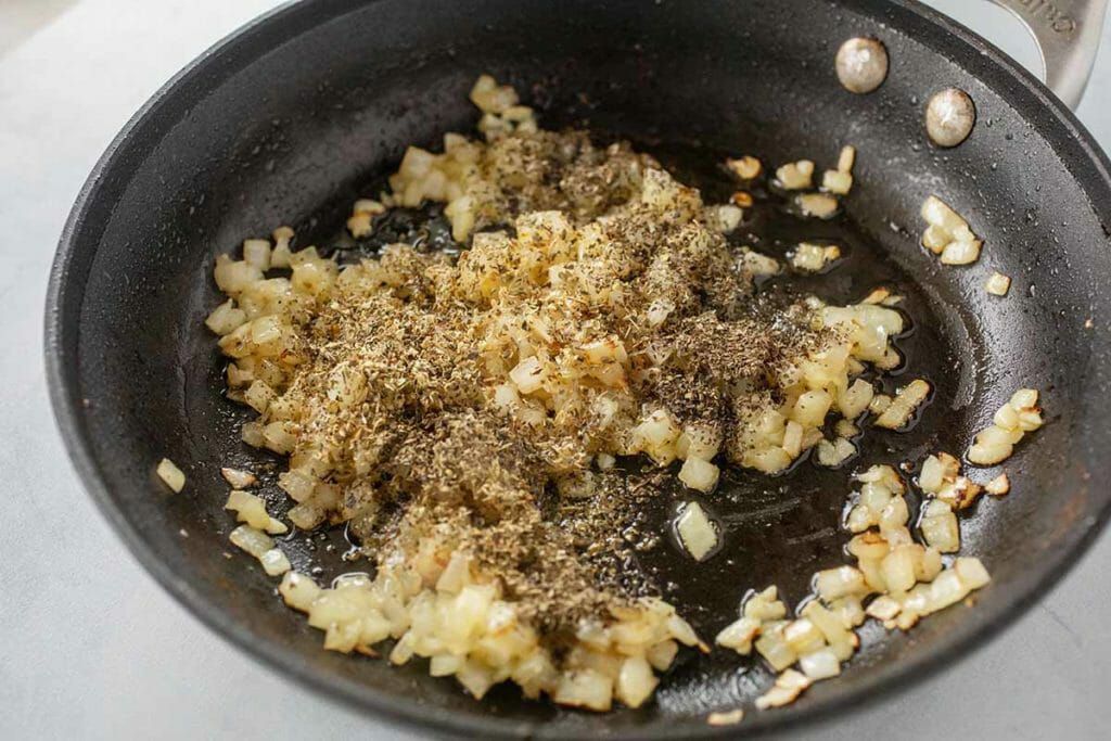 Cooking onions for skillet chicken and rice