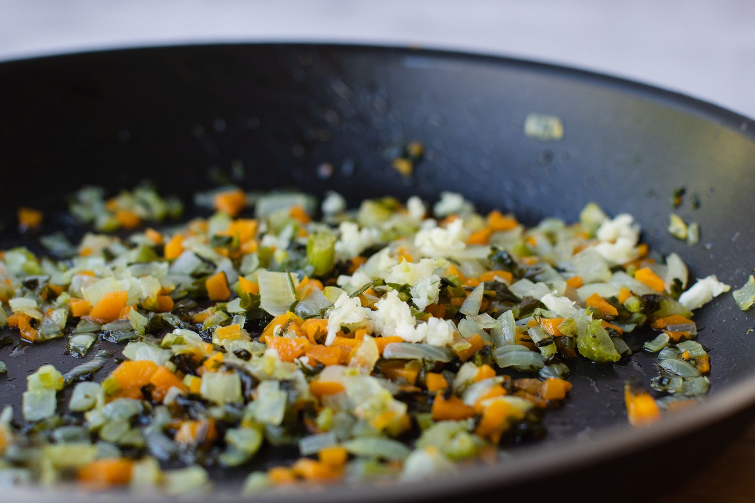 How to make marinara by cooking a Sofrito in a skillet 