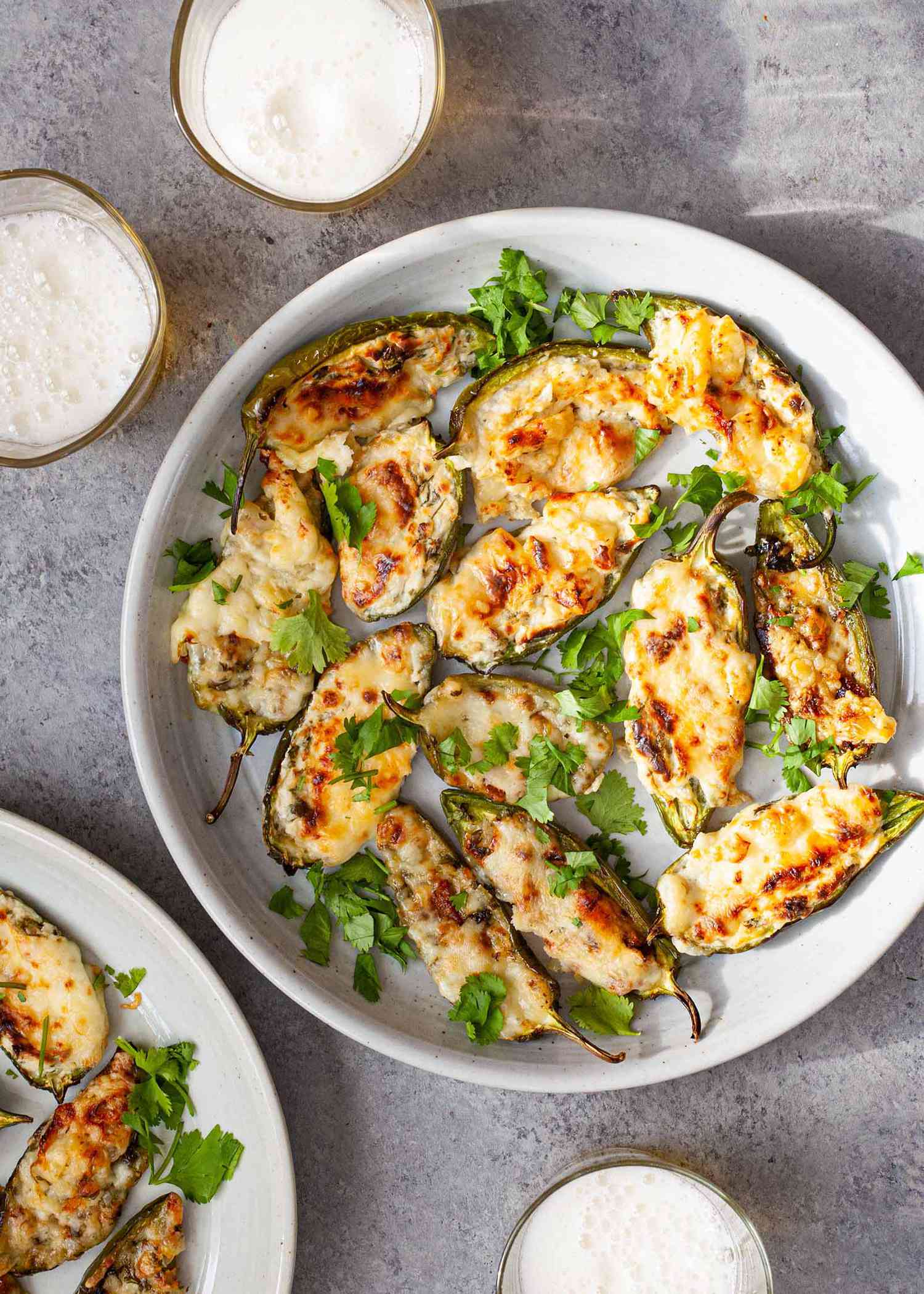 A plate of baked stuffed jalapenos ready to serve and eat