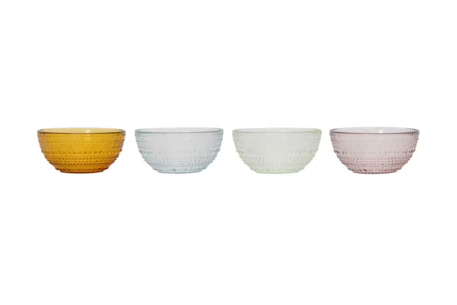 Four colorful glass bowls from ALDI in a row