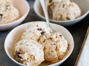 Homemade S’mores Ice Cream Recipe - scoops of ice cream in small bowls on a silver tray