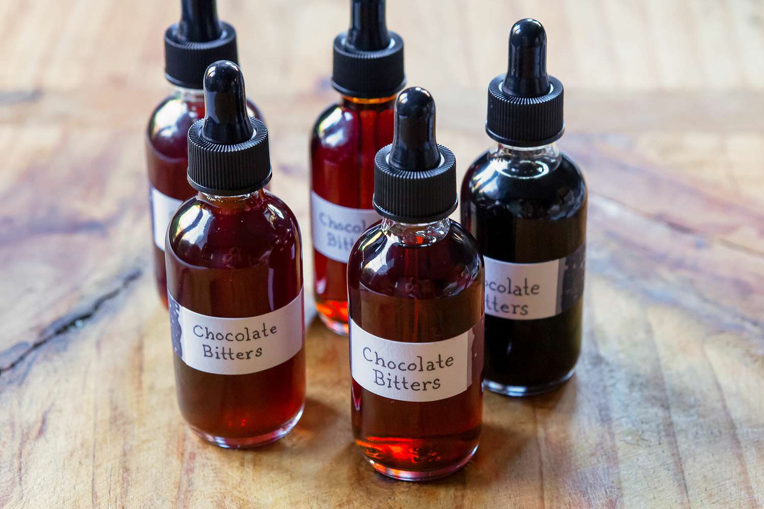 Homemade bitters in small dropper bottles.