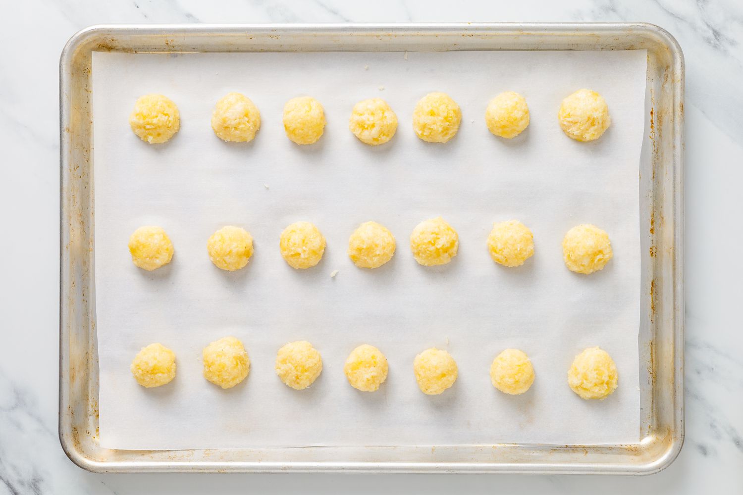 Mashed potato divided into smaller portions for potato candy recipe