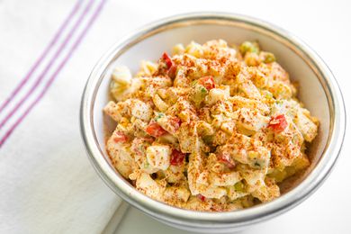 Bowl of Deviled Egg Salad Topped With Paprika