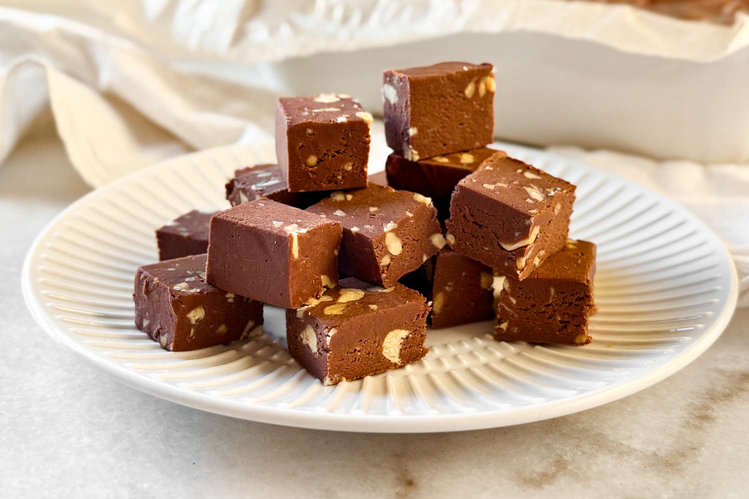 plate of Mamie Eisenhower’s Million Dollar Fudge cut into pieces