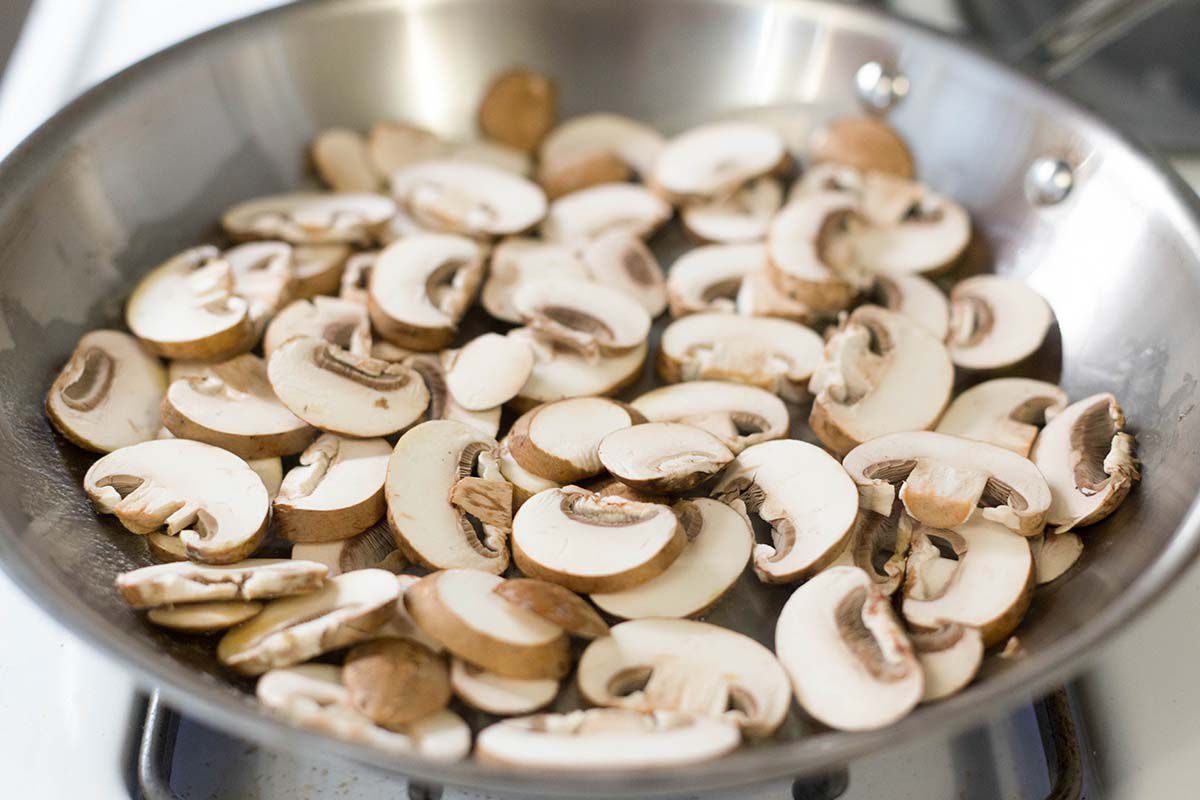 cooking mushrooms for Scrambled Eggs with Spinach, Beef, and Mushrooms