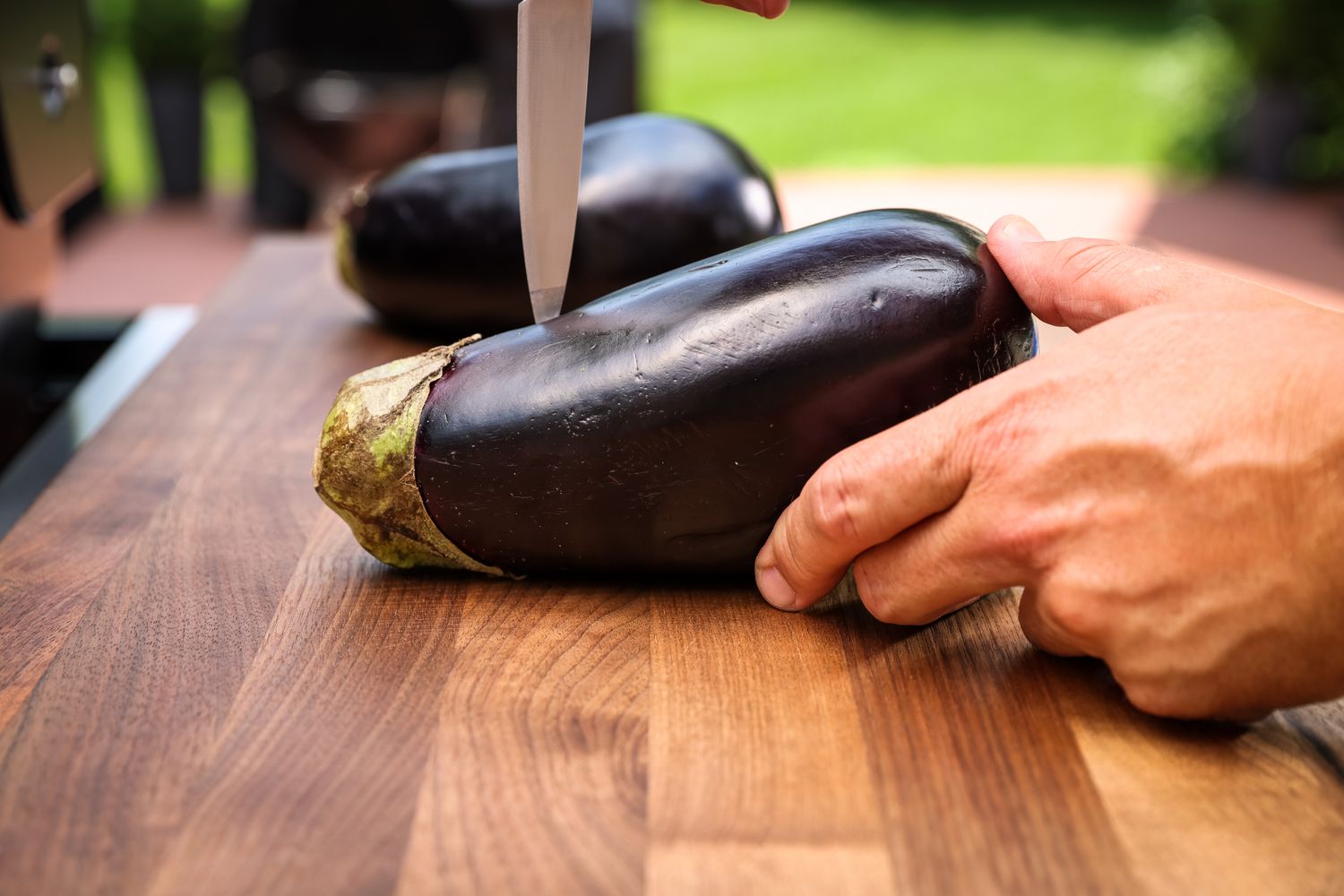 Eggplant Pierced on Cutting Board for Grilling Recipe 