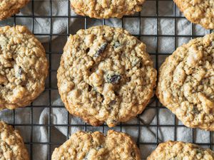 Overhead view of Oatmeal Raisin Cookies cooling on a rack.