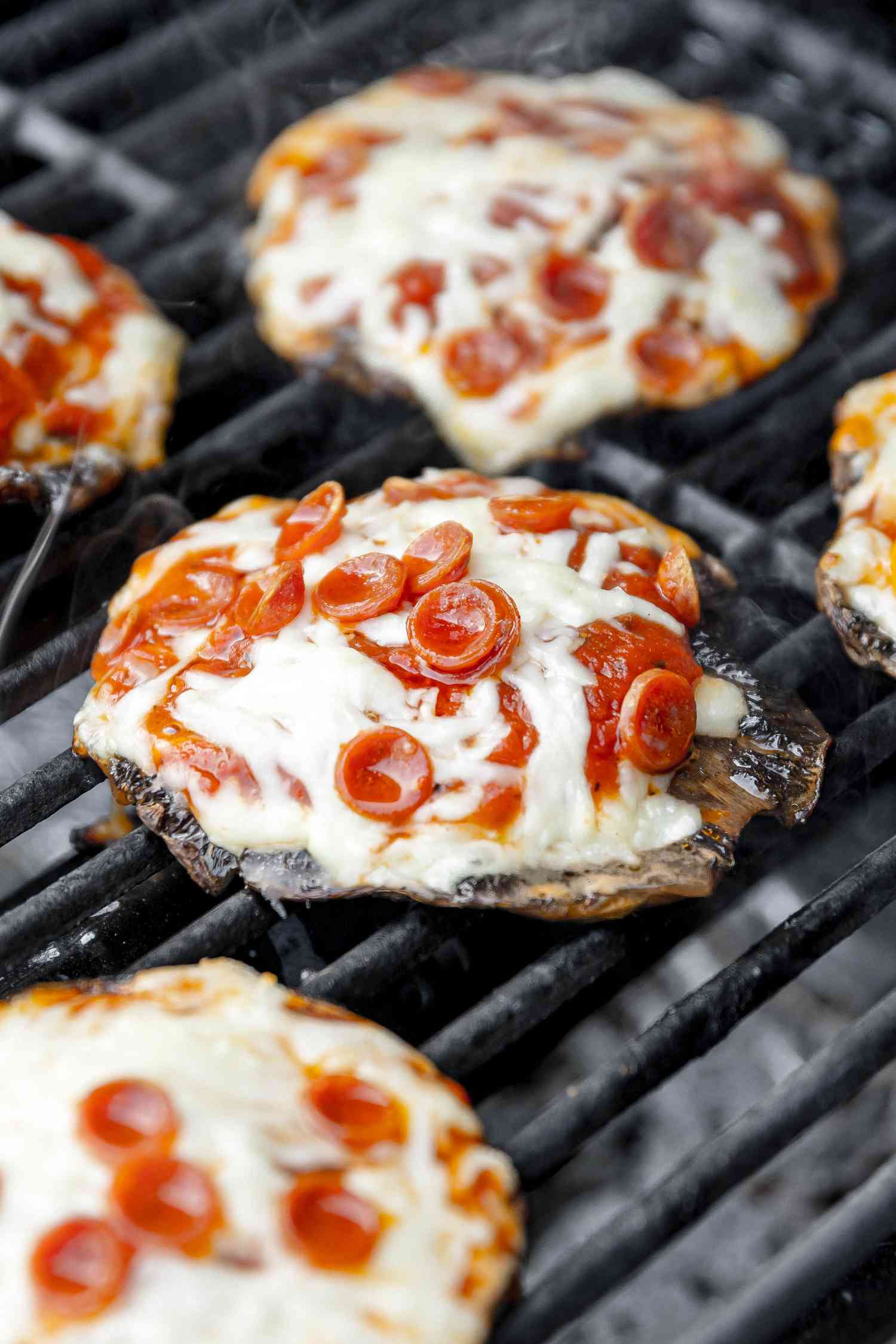Grilled Portobello Mushrooms Topped With Mini Pepperoni on the Grill