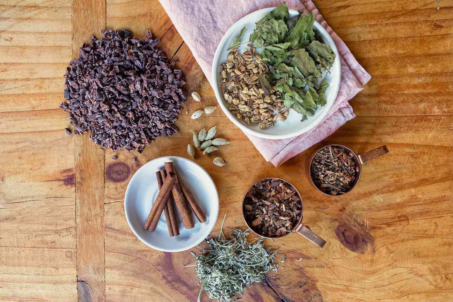 A variety of spices, herbs and roots to make Chocolate cocktail bitters.