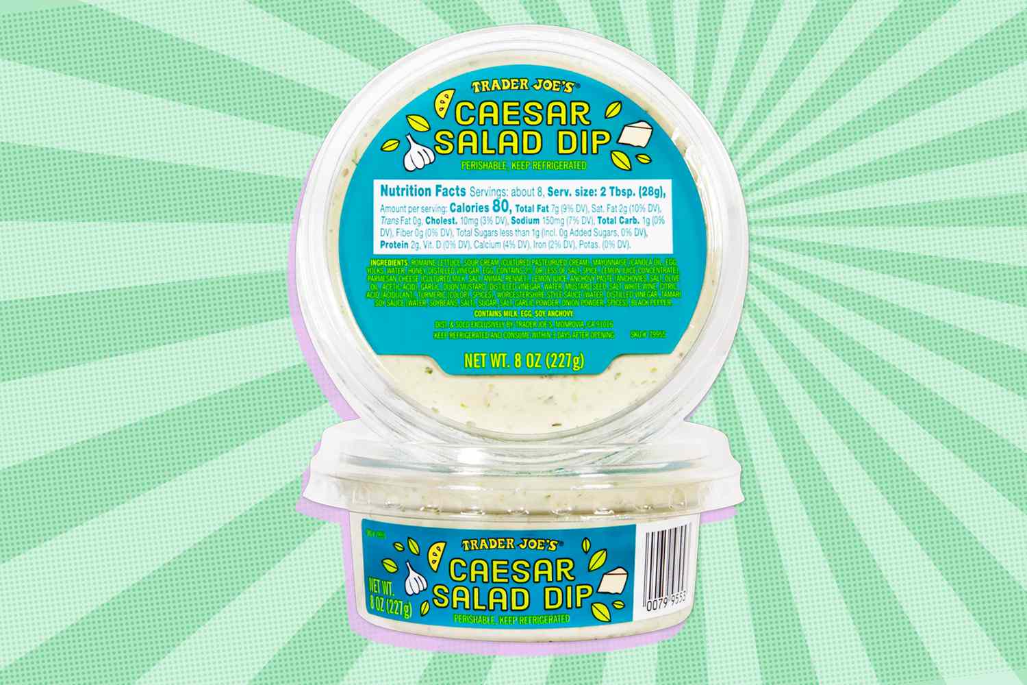 Photo of two containers of Trader Joe's Caesar Salad Dip on a light green striped and speckled background
