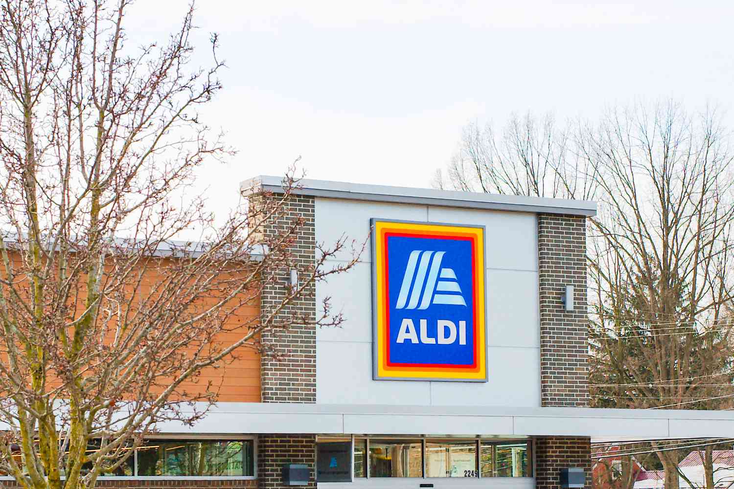 An Aldi store front with its logo displayed prominently on the building
