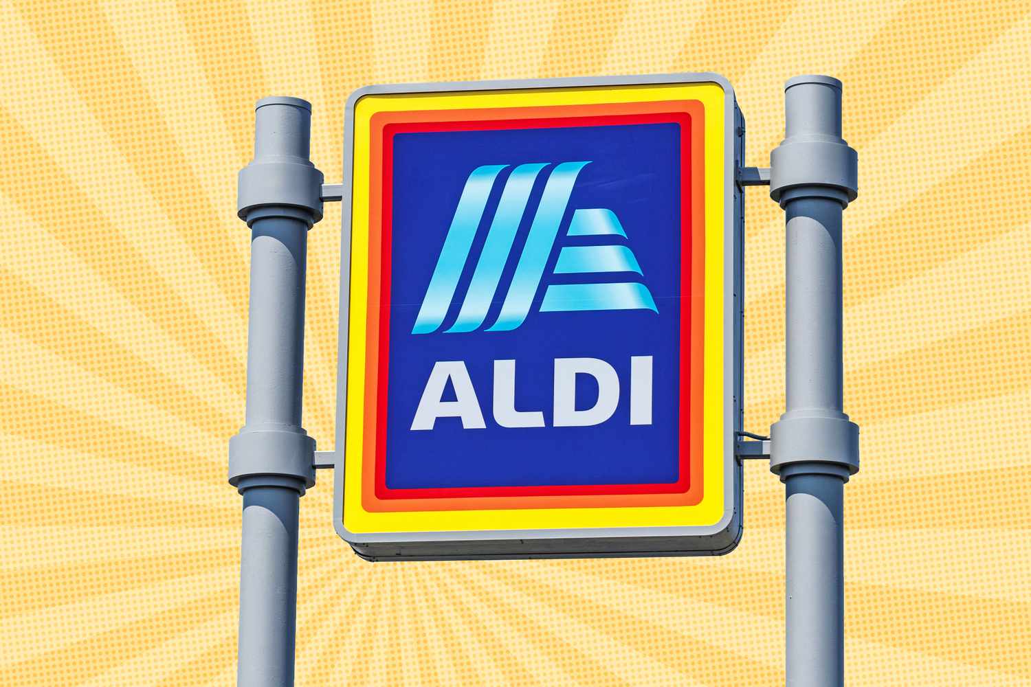An ALDI store sign on a yellow illustrated background