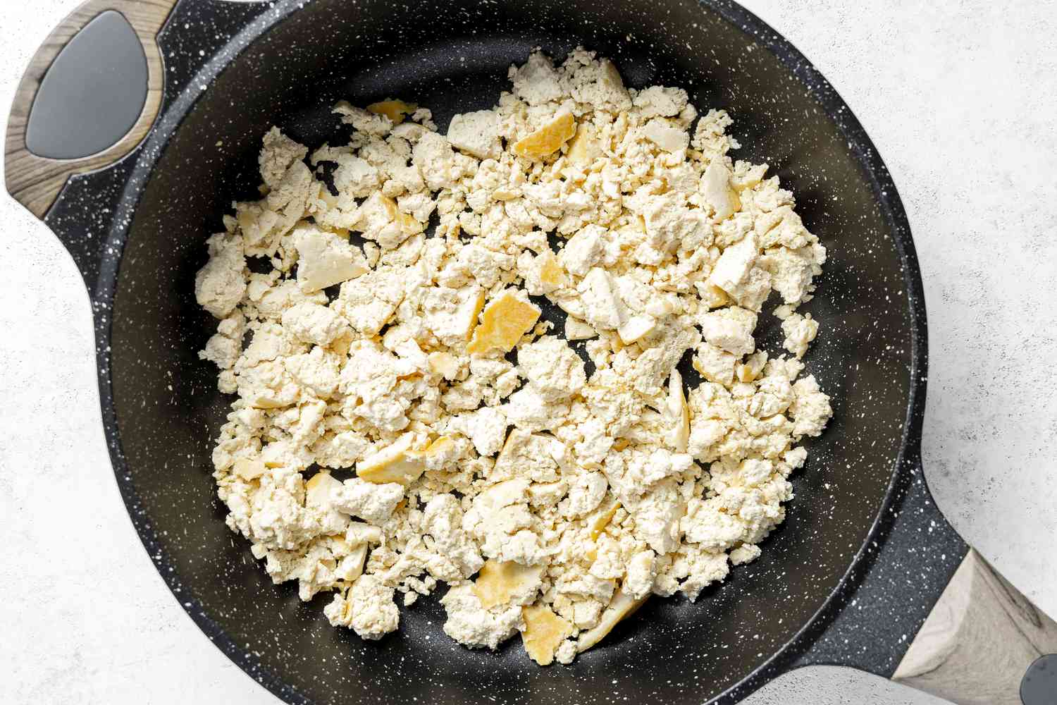 Crumbly Tofu Dry Frying on a Skillet for Copycat Chipotle Sofritas