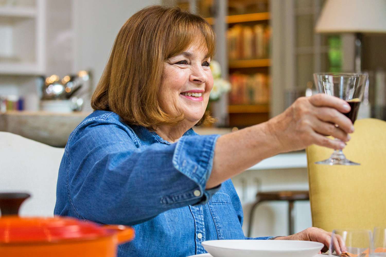 Ina Garten raising a glass of wine
