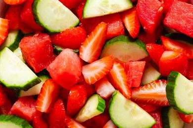 close up view of Hydration Salad - watermelon pieces, sliced strawberries, and sliced cucumbers
