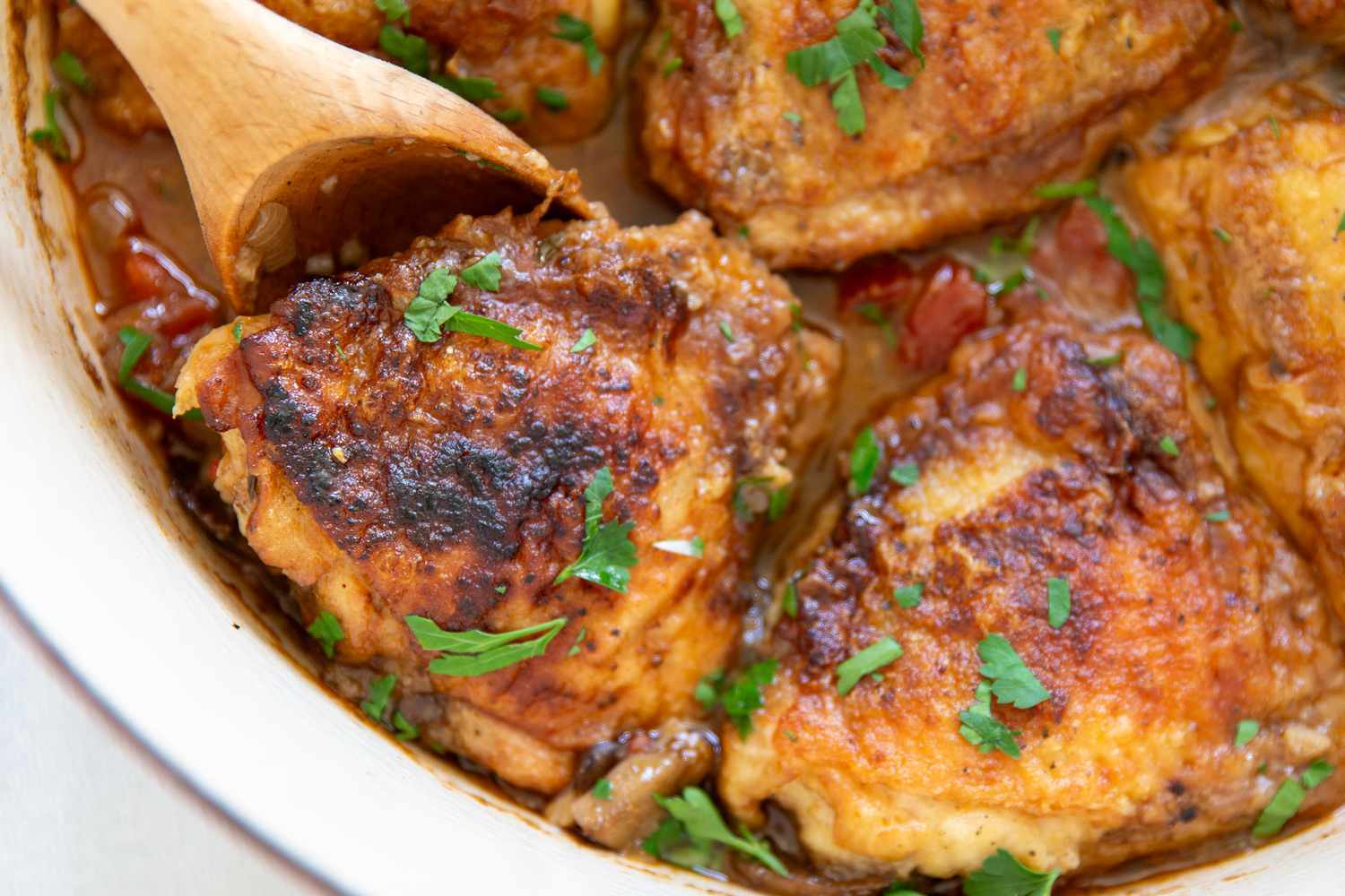 chicken marengo in a dutch oven (close-up)