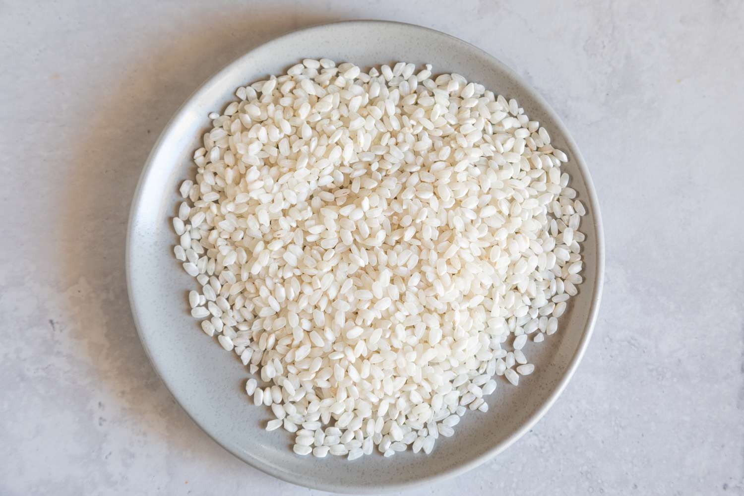 valencia rice on a grey plate