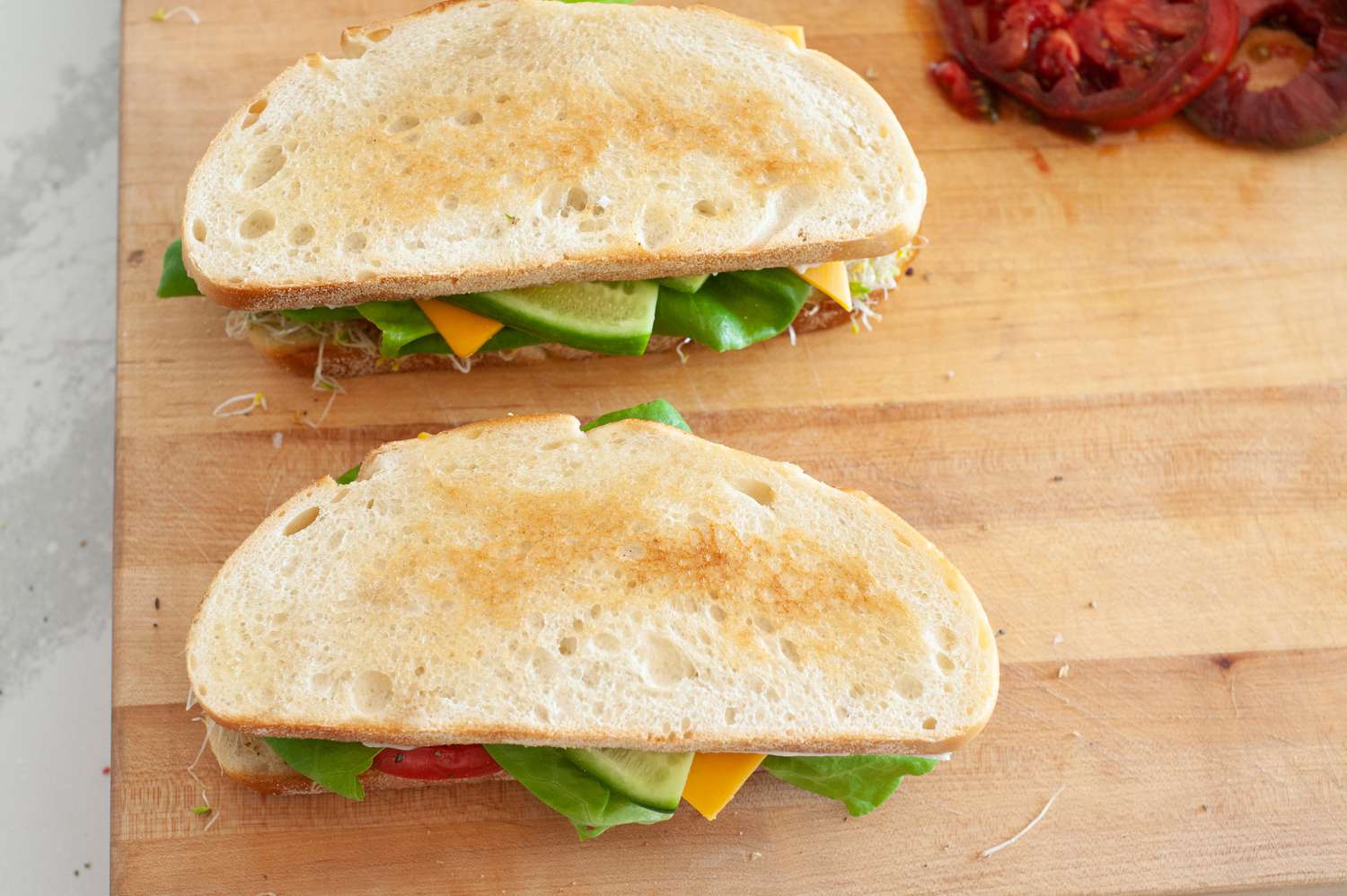 Slices of Bread Added to Loaded Veggie Sandwiches
