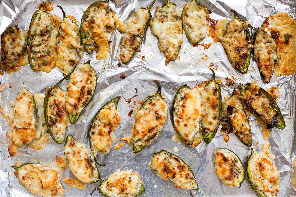 Stuffed Jalapeño Peppers on a foiled baking sheet