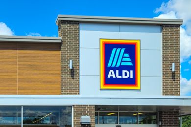 Aldi storefront with logo prominently displayed on the building