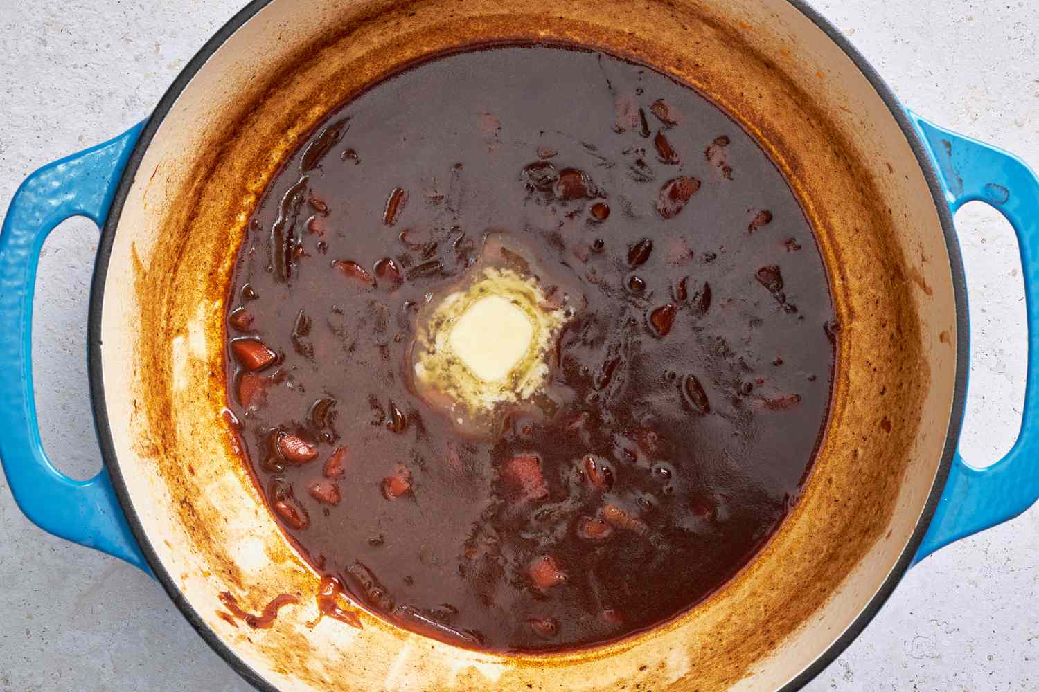 Butter added to braising sauce for rouladen recipe