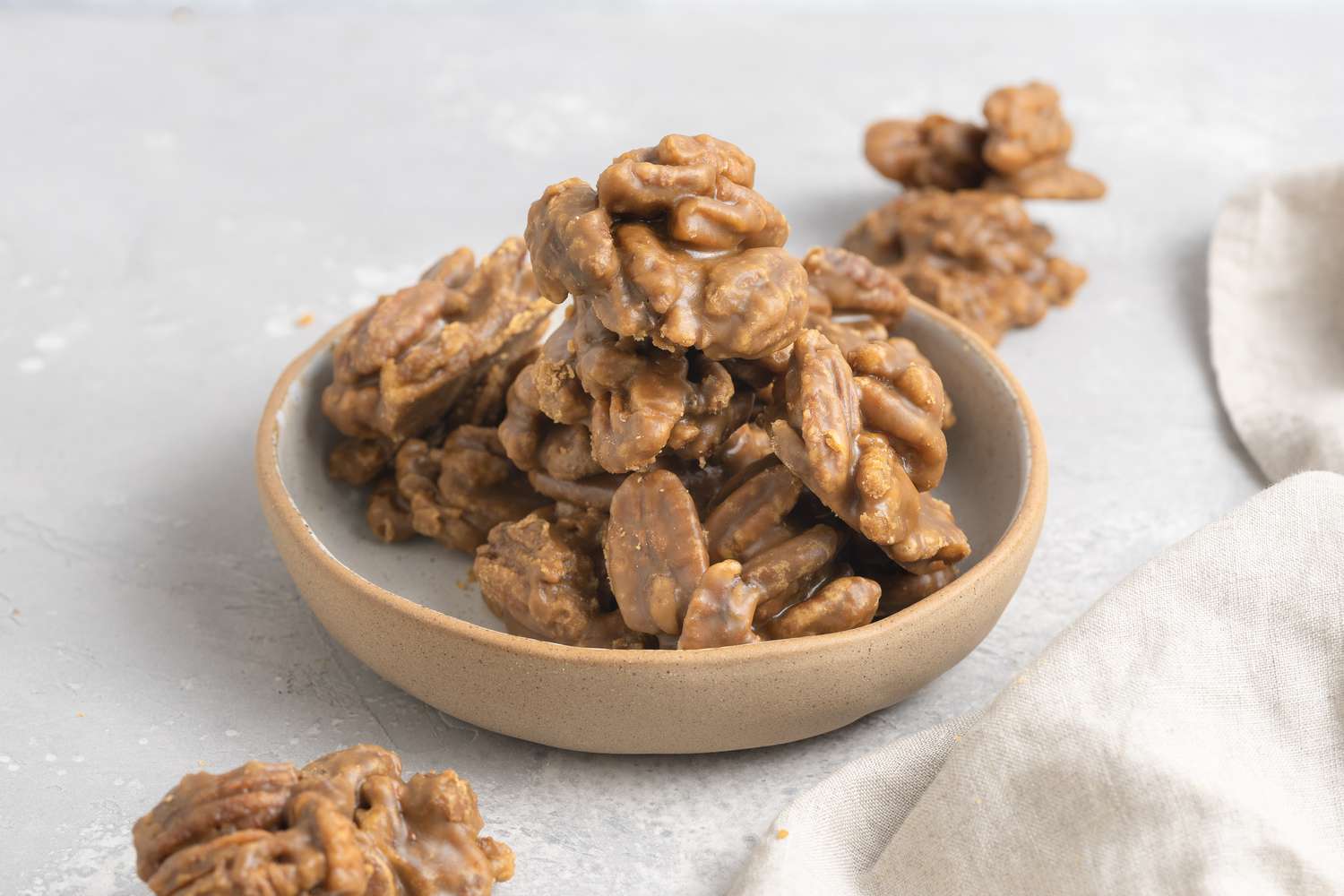 A bowl of praline candy.