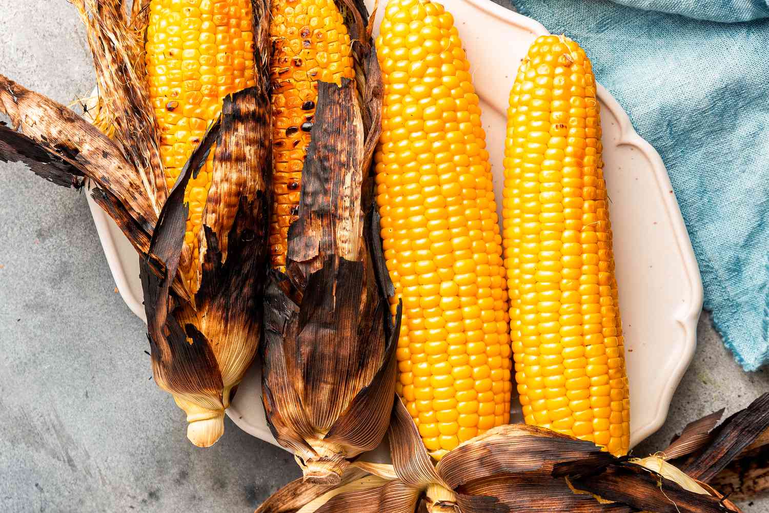 grilled corn on a platter
