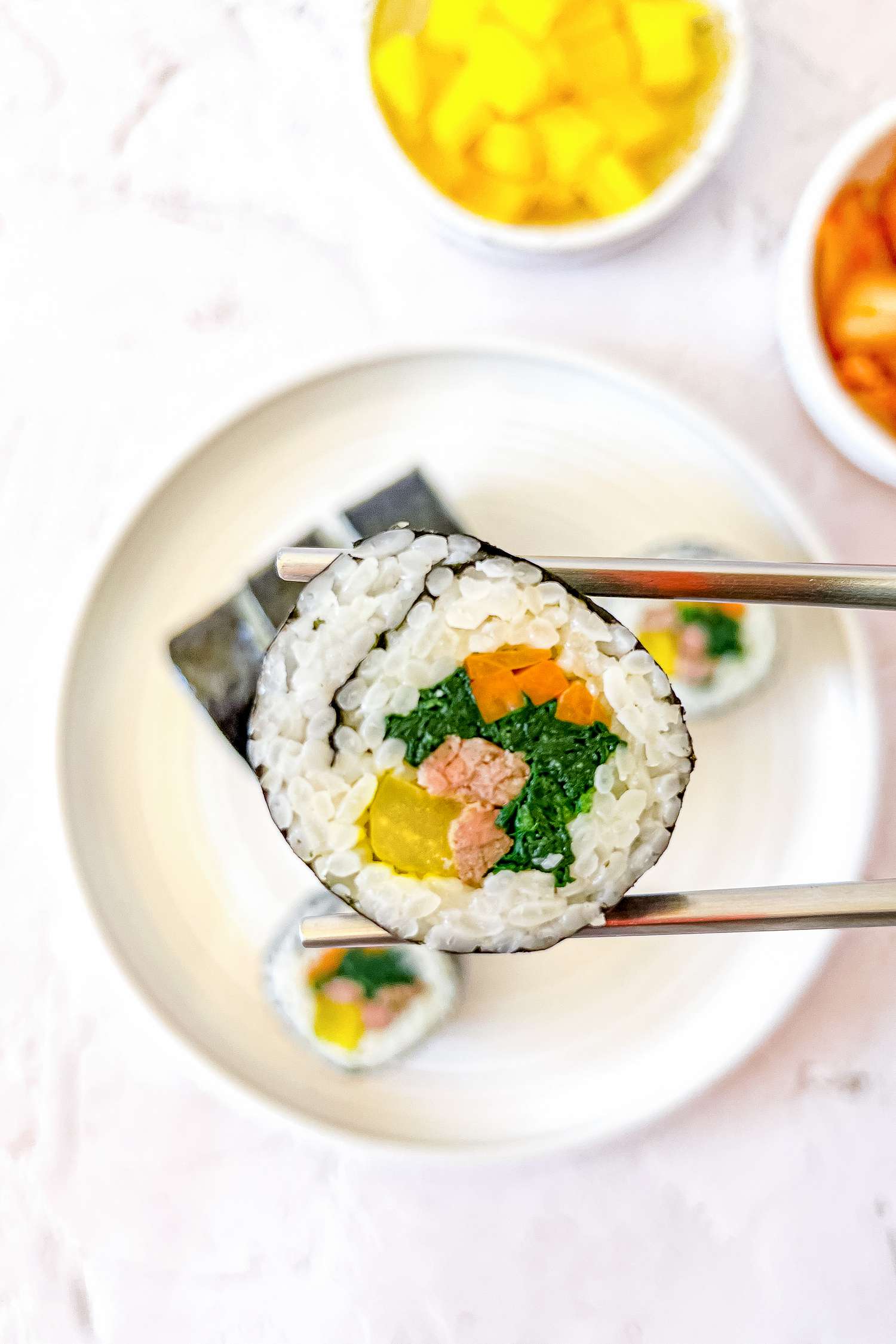 Classic Kimbap Held Using Chopsticks