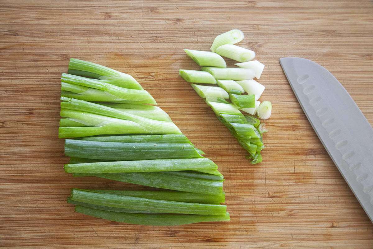 Scallions chopped at a diagonal for an easy homemade kimchi recipe.