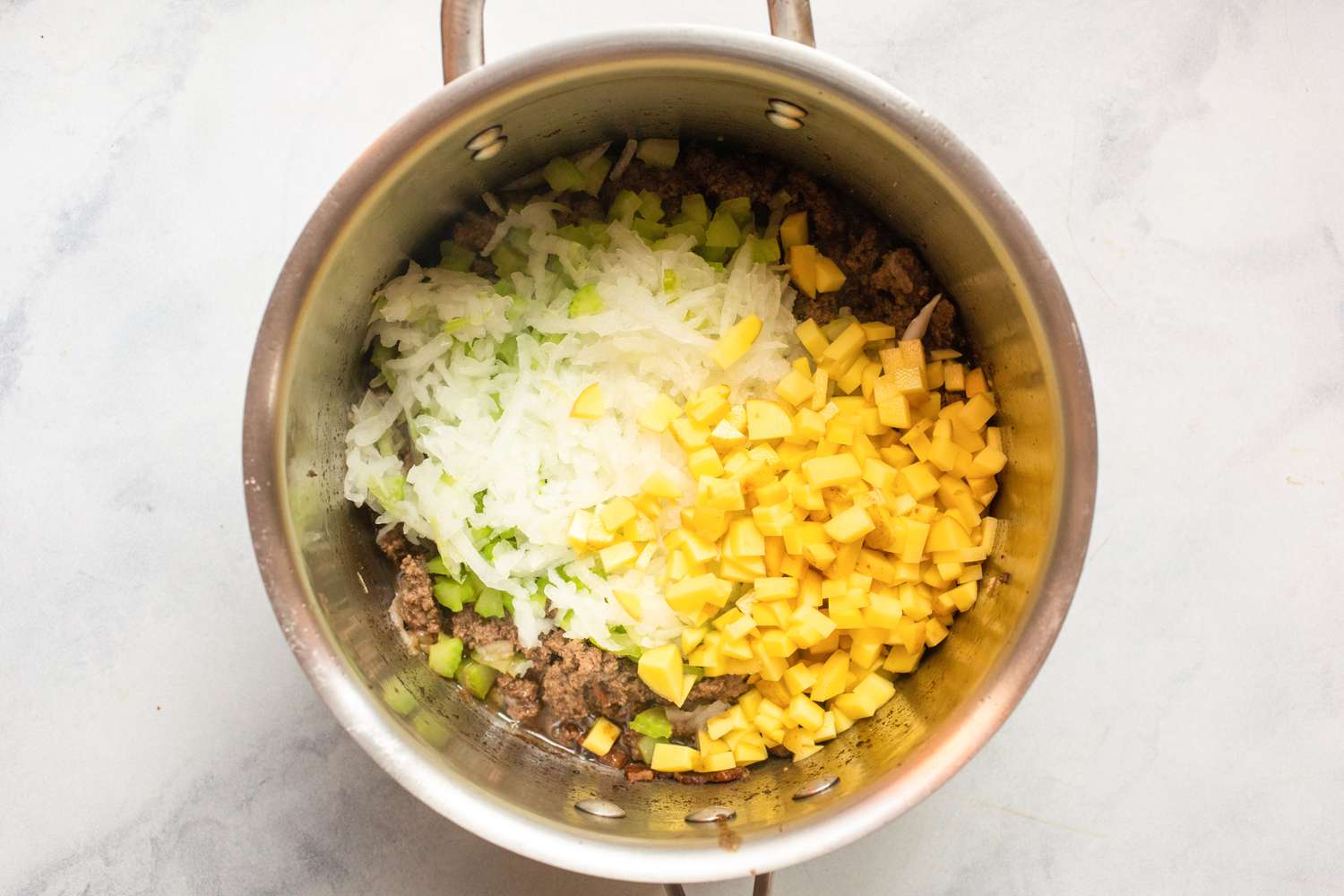 Add the vegetables and seasonings. 