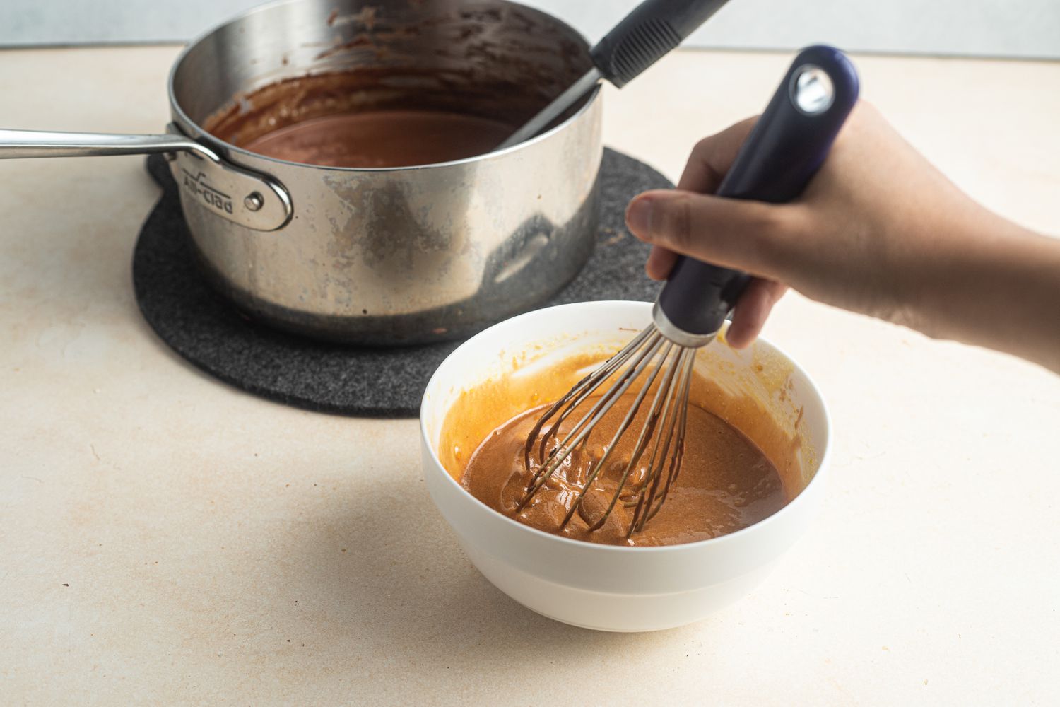 Whisk Chocolate and Egg Mixture for Pots de Creme Recipe