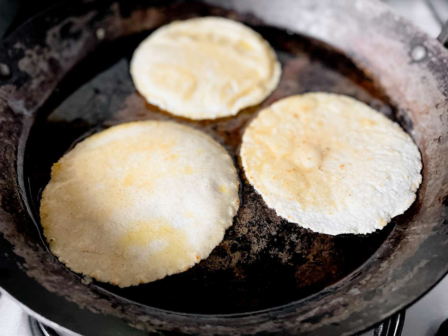 Corn Tortillas Heated in Oil for Carnitas Enchiladas