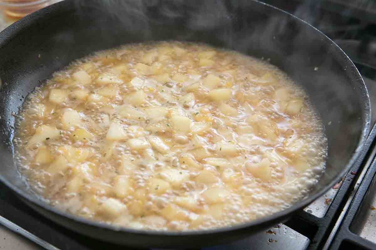 add stock to pears for pork chops with pears