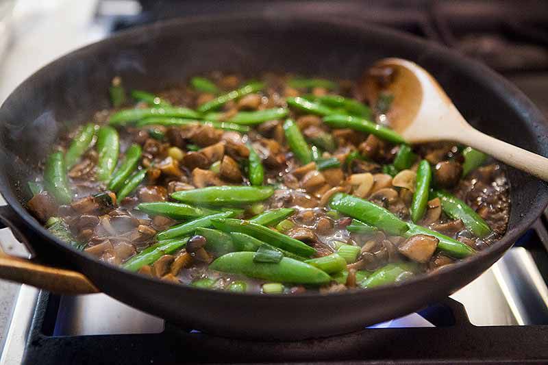 finished mushrooms peas in stir fry sauce