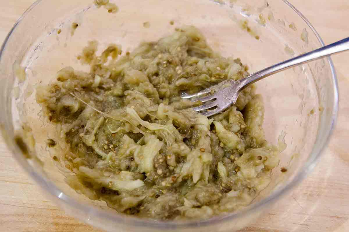 mash eggplant with fork for baba ganoush