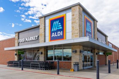 Aldi supermarket exterior with shopping carts near the entrance